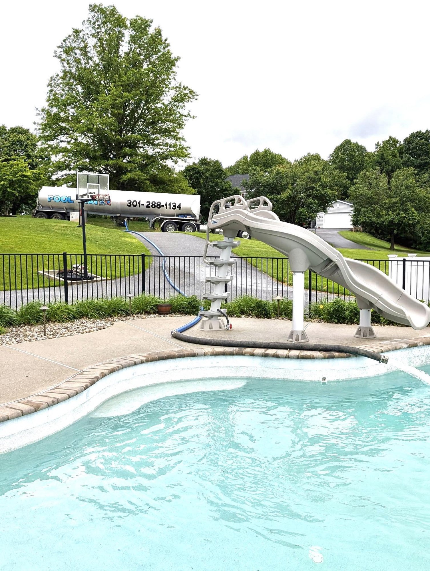 Backyard swimming pool being filled by MD Pool Water in Frederick, MD